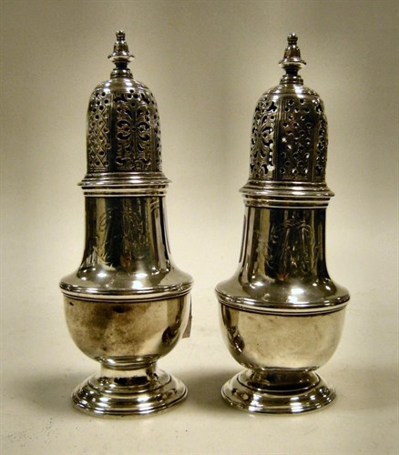 Lot 468 - A pair of George II pepper casters