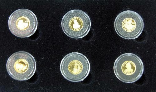 Lot 307 - "Fine Gold Miniature Characters of Note"