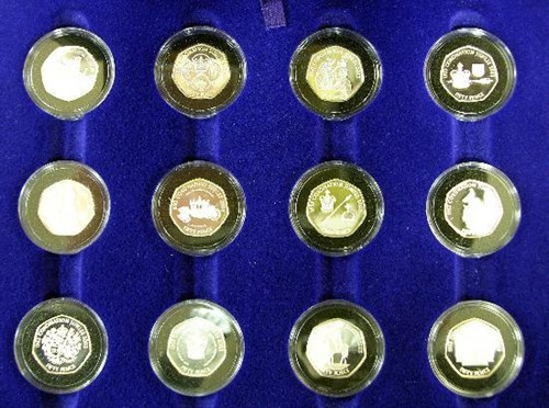Lot 312 - Channel Islands, 2003, Twelve Sterling silver proof fifty pence coins