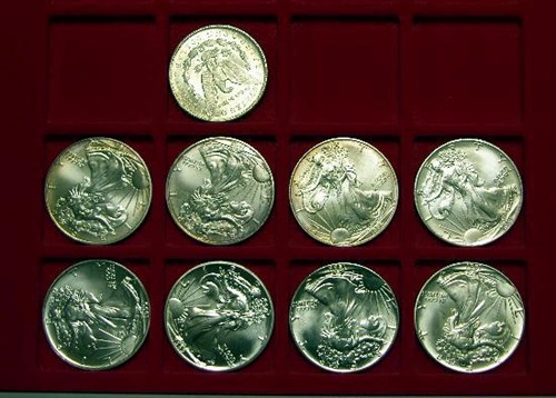 Lot 313 - Nine US silver dollar coins