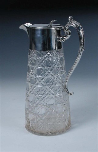 Lot 402 - An Edwardian silver mounted claret jug