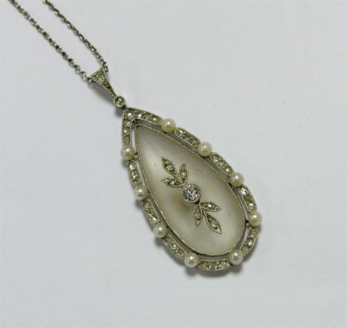 Lot 224 - A tear drop shaped pearl and diamond pendant