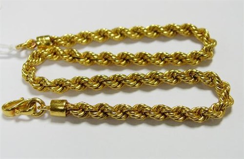 Lot 275 - A Chinese yellow metal ropetwist necklace