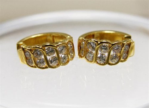 Lot 238 - A pair of hoop earrings