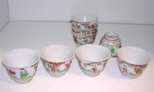 Lot 163 - A collection of eight porcellaneous tea bowls, four character marks of Wanli but later