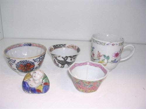 Lot 169 - Three tea bowls, famille rose cup and a Kutani figure of Hotei