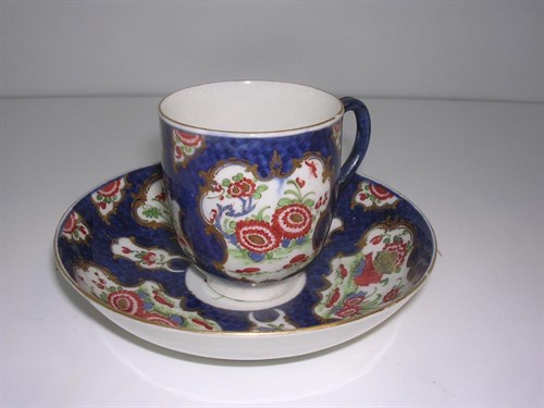 Lot 80 - A Worcester blue scale coffee cup and saucer