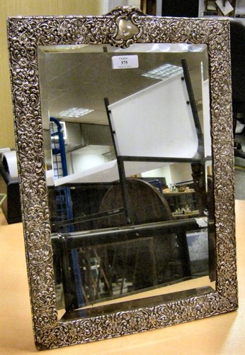 Lot 375 - A silver mounted dressing table mirror