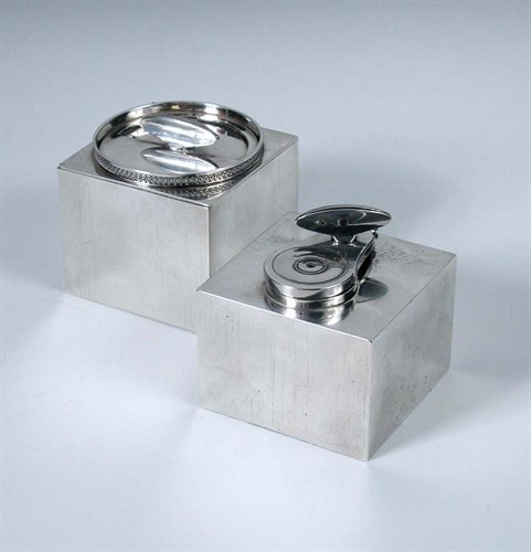Lot 352 - An early 19th century French silver travelling inkwell and a companion sand caster