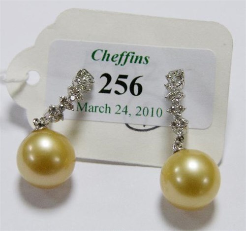 Lot 256 - A pair of bronze tinted cultured pearl and diamond earpendants