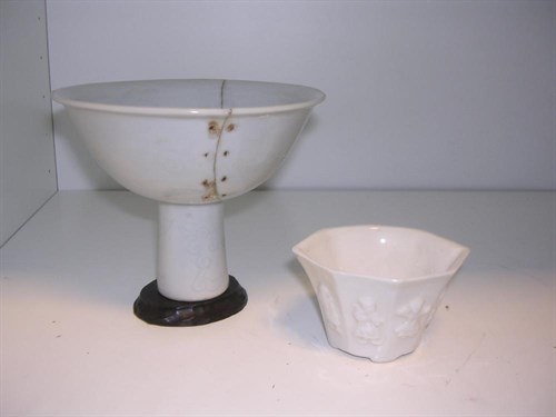 Lot 178 - A white glazed stem cup, six character mark and period of Wanli
