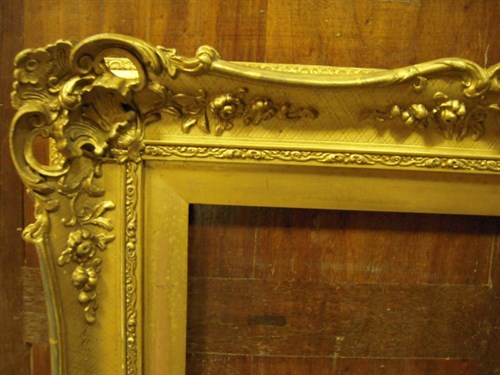 Lot 739 - A 19th Century English swept gilded frame,...