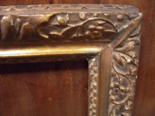 Lot 741 - An English Lely-style carved frame, sight size...
