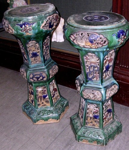 Lot 182 - A pair of Ming style pottery jardiniere stands