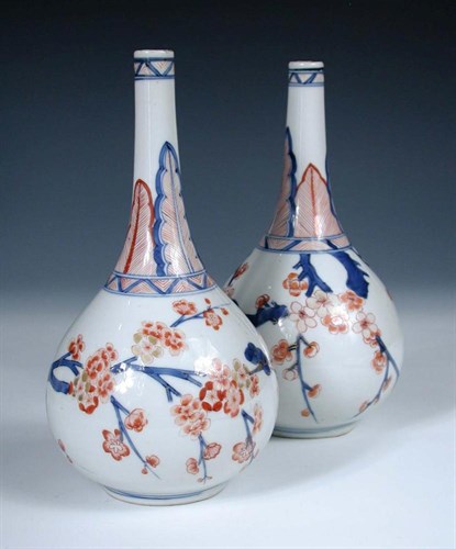 Lot 185 - A pair of early 18th century Chinese Imari bottle vases