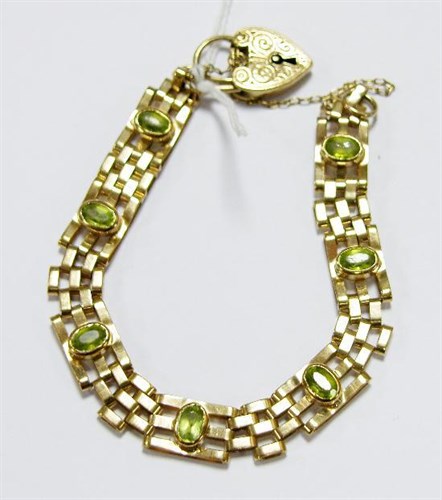 Lot 244 - A 9ct yellow gold three bar gate bracelet