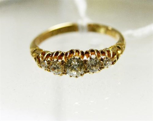 Lot 283 - An Edwardian 18ct yellow gold and diamond...
