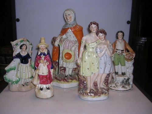 Lot 15 - Five various 19th century Staffordshire groups