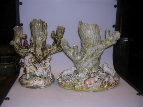 Lot 20 - Attributed to Wood, two late 18th century triple tree trunk spill vases