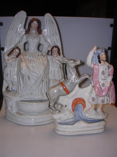 Lot 22 - Attributed to Samson Smith, Balaam and his ass 'Perfect, and a Staffordshire holy water stoup group