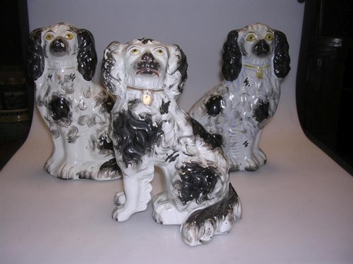 Lot 26 - Three Staffordshire black and white spaniels
