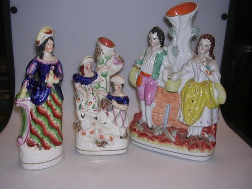 Lot 32 - Three 19th century Staffordshire groups