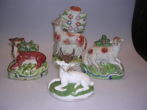 Lot 42 - Four 19th century Staffordshire wares featuring sheep and deer
