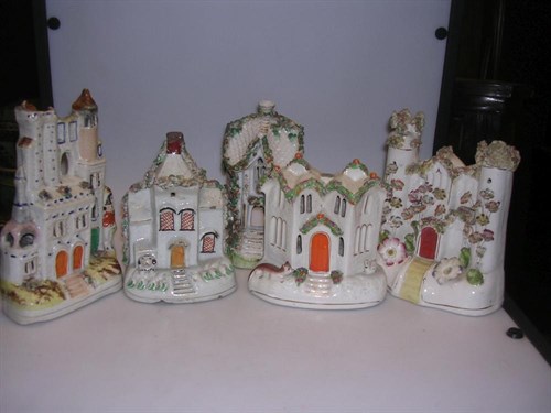 Lot 48 - Five Staffordshire cottages and castles