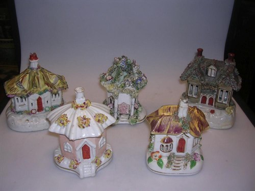 Lot 49 - Five various Staffordshire cottages