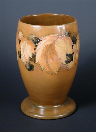 Lot 480 - A rare Moorcroft leaves and berries pattern vase