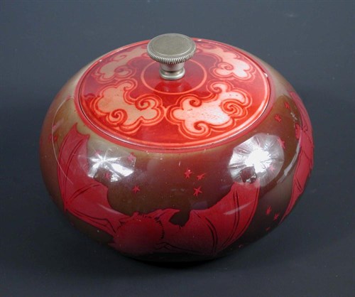 Lot 482 - A Bernard Moore flambé tobacco jar and cover