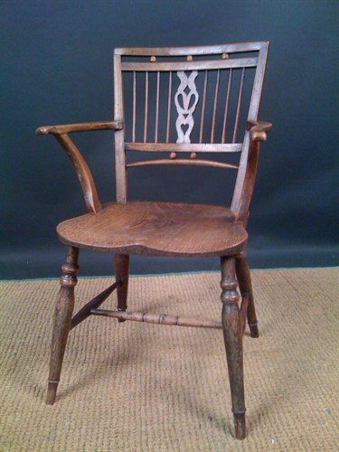 Lot 121 - An 18th century ash and elm Mendlesham armchair