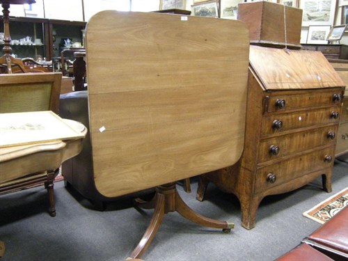 Lot 73 - A Regency mahogany tilt top table