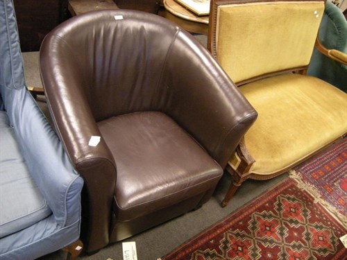 Lot 64 - A leather tub chair