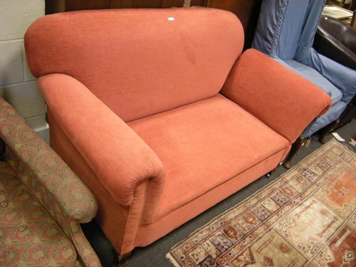 Lot 66 - A two seater drop end sofa