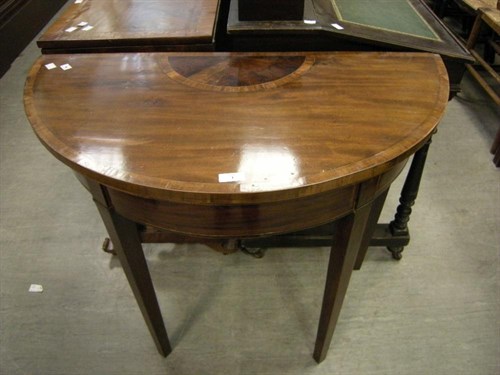 Lot 1 - A mahogany inlaid demi lune card table