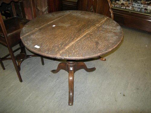 Lot 13 - An oak tripod table, a mahogany wash stand (2)