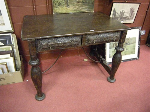 Lot 147 - A Spanish chest nut table