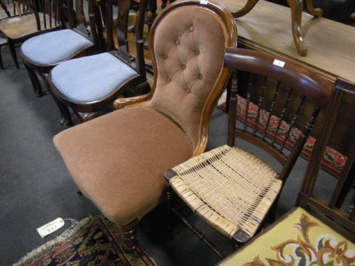 Lot 44 - A Victorian spoon backed chair and another