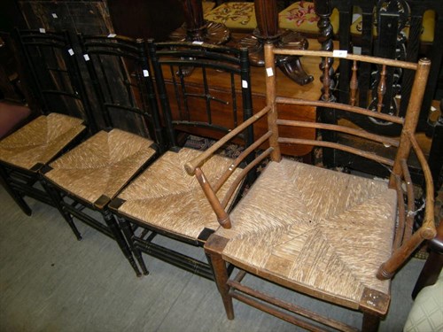 Lot 25 - A Morris style ash armchair with rush seat and...