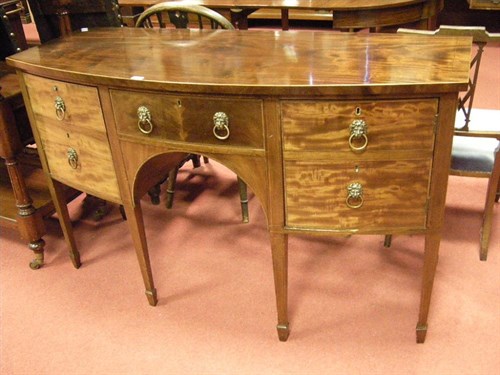Lot 163 - A 19th century bow fronted sideboard