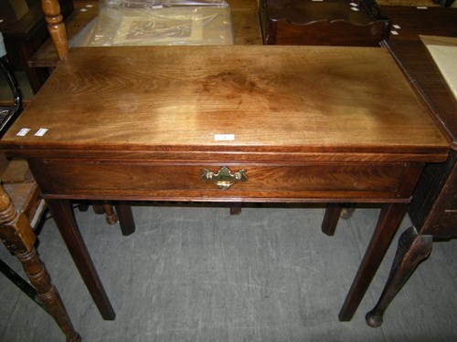 Lot 4 - A George III mahogany tea table with drawer