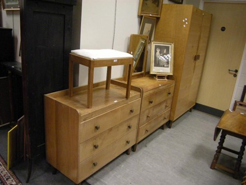 Lot 84 - A Gordon Russell oak wardrobe, single bed,...