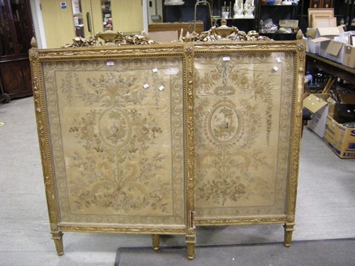 Lot 144 - A pair of gilt framed silkwork screens