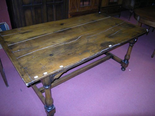 Lot 169 - A reproduction oak refectory table