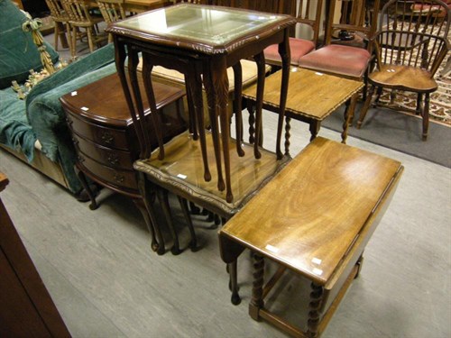 Lot 93 - Two nests of tables, a chest on stand and...