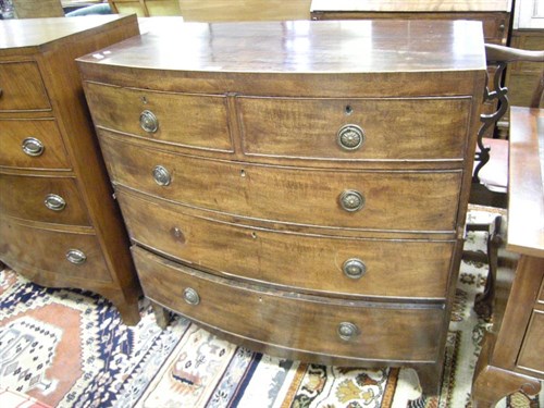 Lot 119 - A mahogany bow front chest of drawers