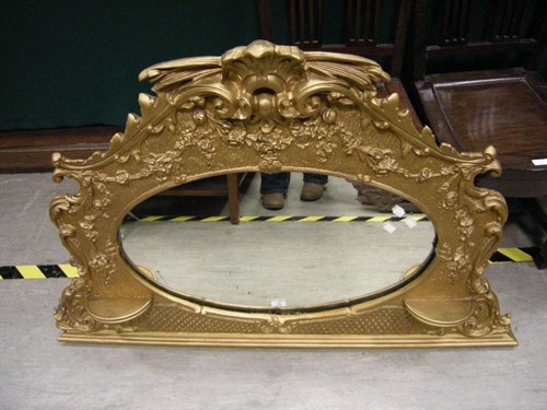 Lot 126 - A gilt overmantle mirror