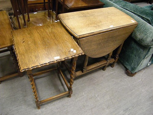 Lot 94 - An oak drop leaf table and another