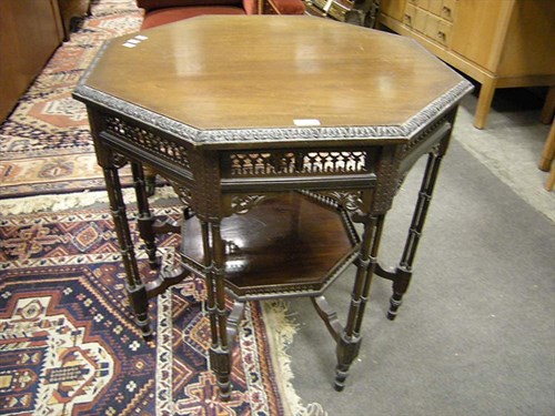 Lot 122 - An octagonal cluster column centre table